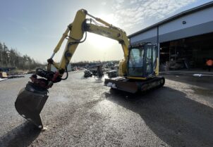 New Holland E 75 Csr